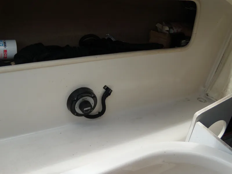 Slide: The Image of Storage compartment in a 2001 Sea Ray 260 Bow Rider Select boat. - 8