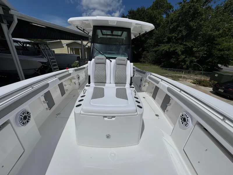 Slide: The Image of 2026 Caymas 30 CT boat interior with seating and storage compartments. - 20