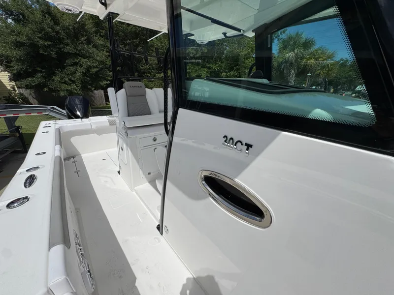 Slide: The Image of 2026 Caymas 30 CT boat interior with seating and sleek design. - 25