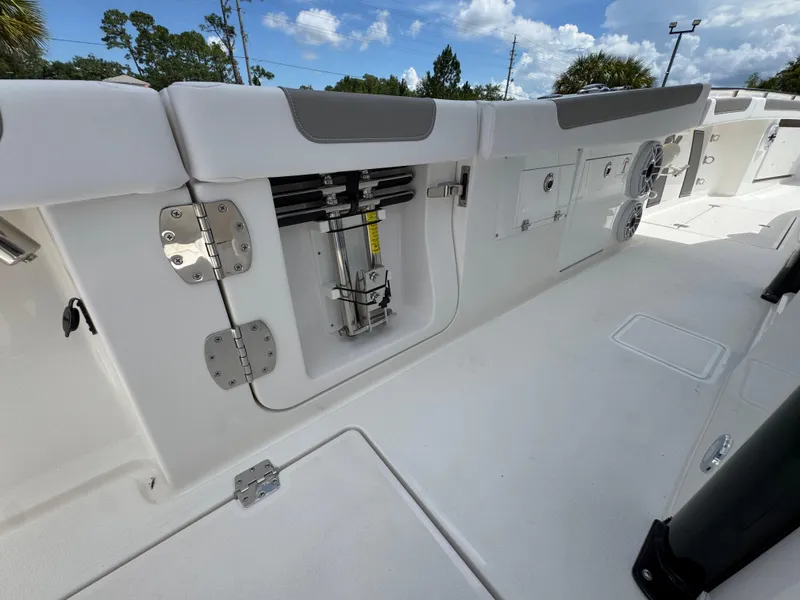 Slide: The Image of 2026 Caymas 30 CT boat interior with storage compartments and sleek design. - 35