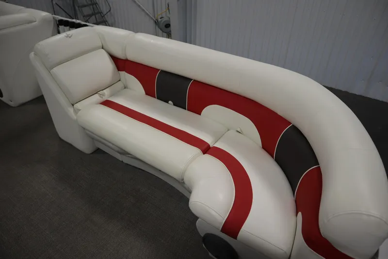 Slide: The Image of Luxurious white and red seating on a 2014 JC 22 Limited boat. - 11