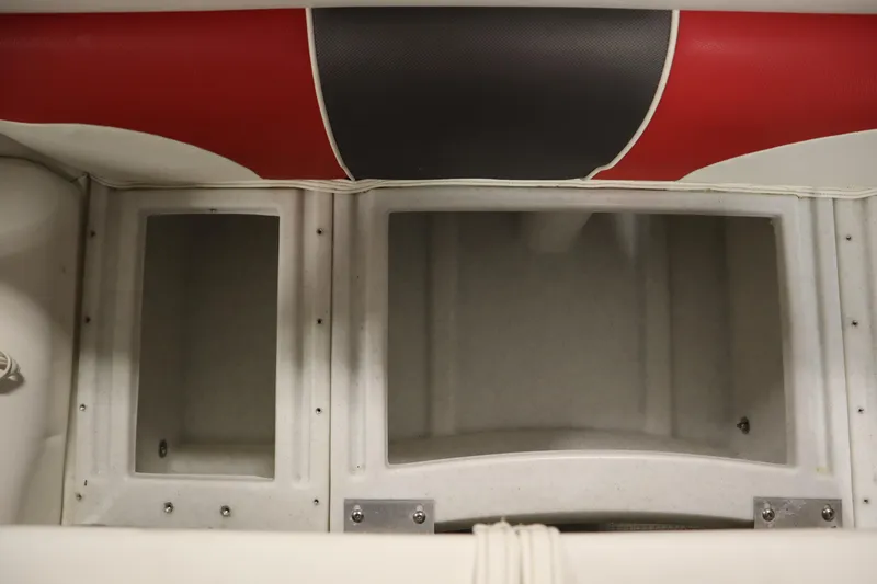 Slide: The Image of Interior of 2014 JC 22 Limited boat with red and black seating. - 13