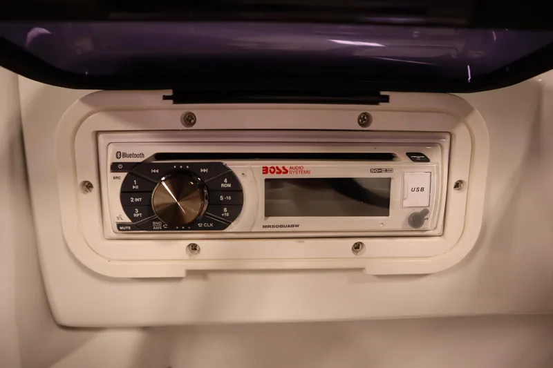 Slide: The Image of Boss audio system with Bluetooth and USB in JC 22 Limited, 2014 model. - 31