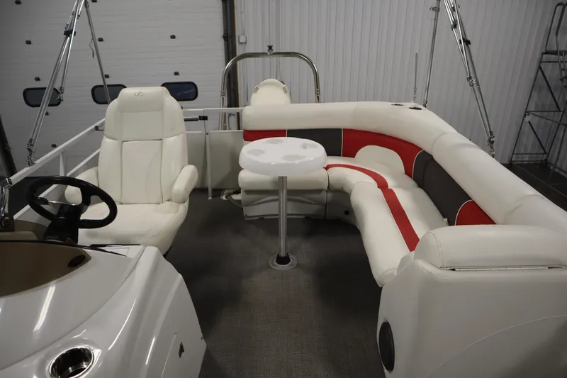 Slide: The Image of Interior of 2014 JC 22 Limited boat with white and red seating. - 37