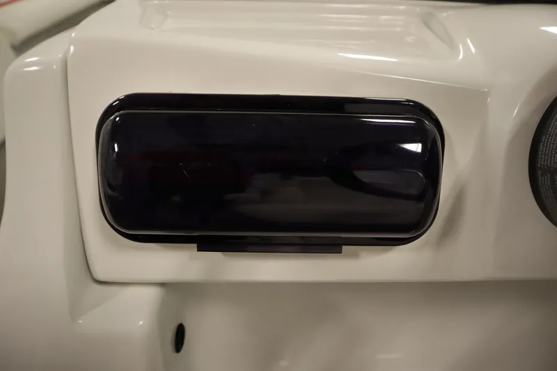 Slide: The Image of Dashboard panel of a 2014 JC 22 Limited boat, featuring a black cover. - 30