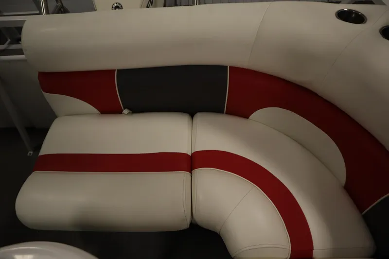 Slide: The Image of Red and white boat seating in a 2014 JC 22 Limited model. - 41