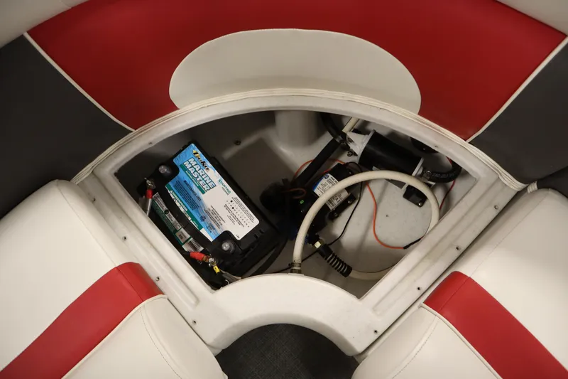 Slide: The Image of Battery compartment of 2014 JC 22 Limited boat with red and white seating. - 42