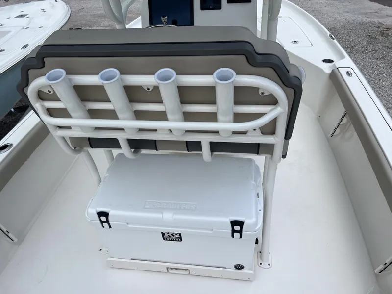 Slide: The Image of 2026 Key West 230 Bay Reef boat with rod holders and cooler on deck. - 11