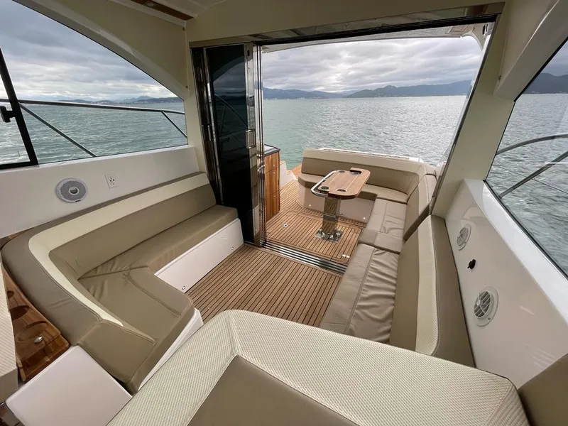 Slide: The Image of Luxurious interior of 2022 Evolve 400HT yacht with scenic ocean view. - 7