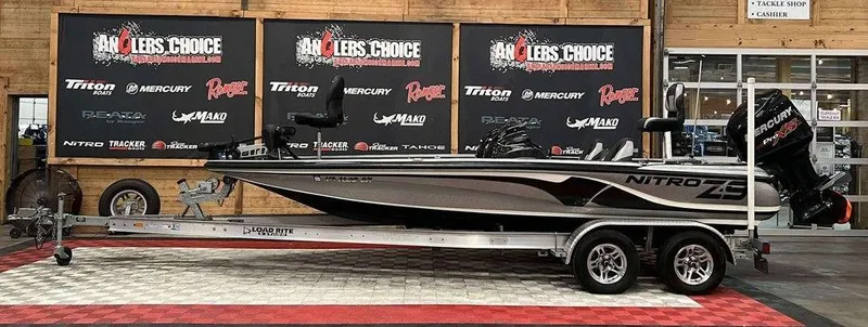 The Image of 2014 Nitro Z Series Z-9 boat on trailer at Anglers Choice showroom. - 1