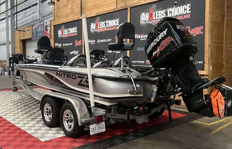 Slide: The Image of 2014 Nitro Z Series Z-9 boat with Mercury Pro XS engine in showroom. - 3