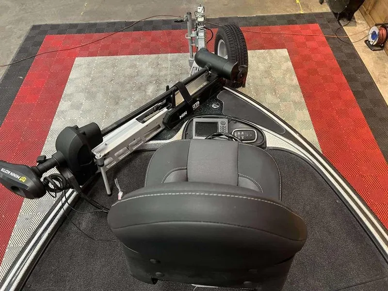 Slide: The Image of 2014 Nitro Z Series Z-9 boat interior with trolling motor and seat. - 8