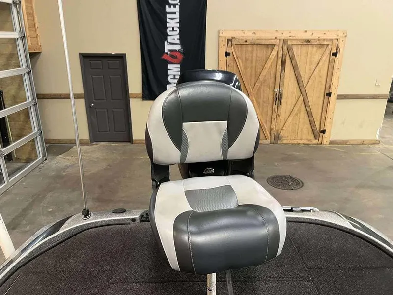 Slide: The Image of 2014 Nitro Z Series Z-9 boat seat in a garage setting. - 9