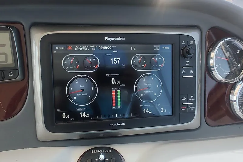 Slide: The Image of Raymarine display on 2015 Meridian 441 Sedan dashboard showing engine and navigation data. - 20