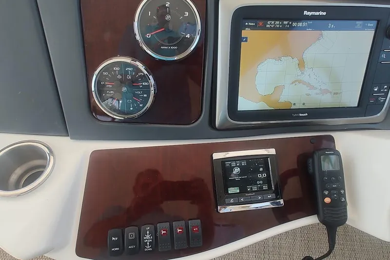 Slide: The Image of Dashboard of a 2015 Meridian 441 Sedan with navigation and control instruments. - 21