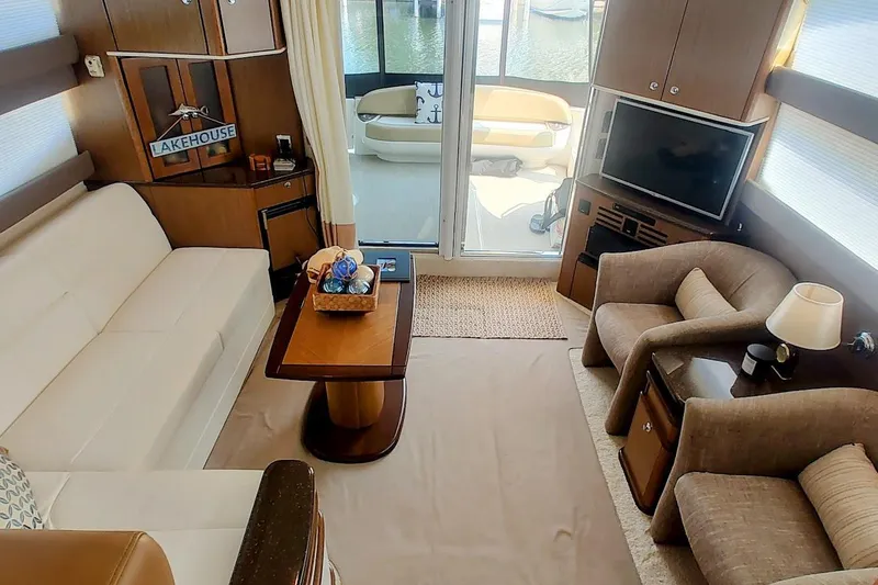 Slide: The Image of Luxurious interior of a 2015 Meridian 441 Sedan yacht with elegant seating and decor. - 22