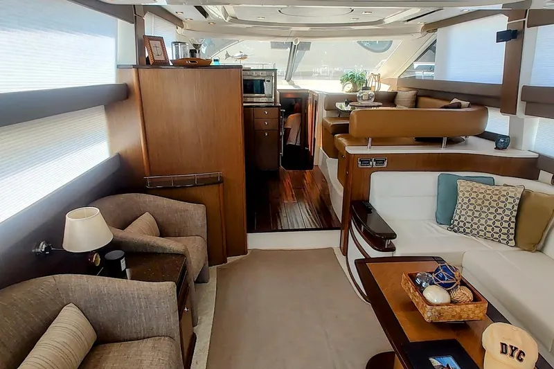 Slide: The Image of Luxurious interior of a 2015 Meridian 441 Sedan yacht with elegant seating and decor. - 23