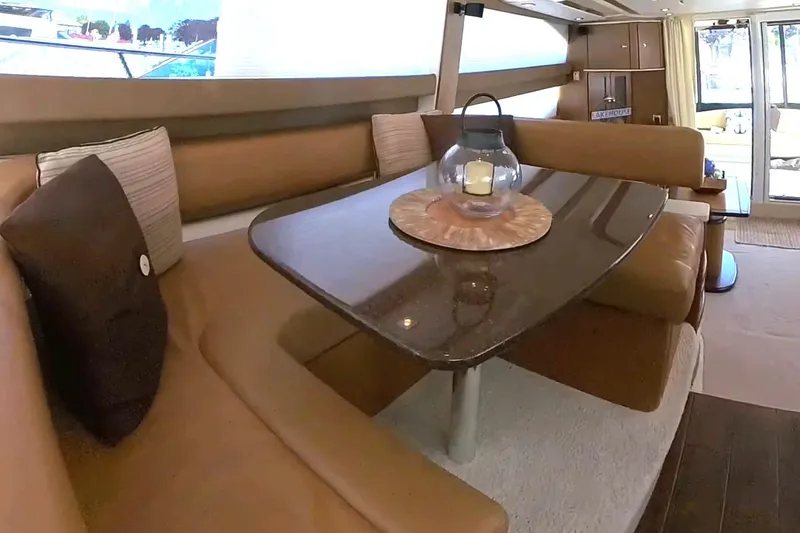 Slide: The Image of Luxurious interior of 2015 Meridian 441 Sedan yacht with elegant seating and table. - 24
