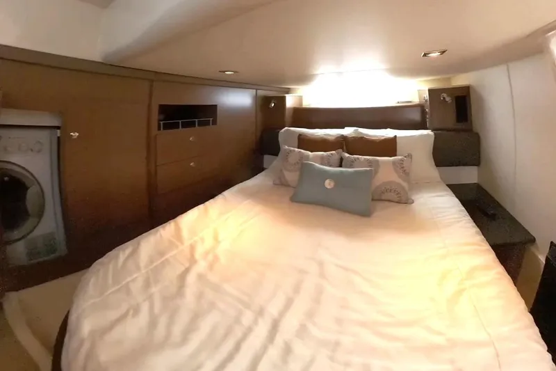 Slide: The Image of Luxurious bedroom interior of 2015 Meridian 441 Sedan yacht with cozy bedding. - 33