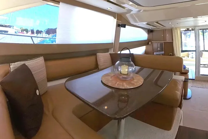 Slide: The Image of Luxurious interior of 2015 Meridian 441 Sedan yacht with elegant dining area. - 36