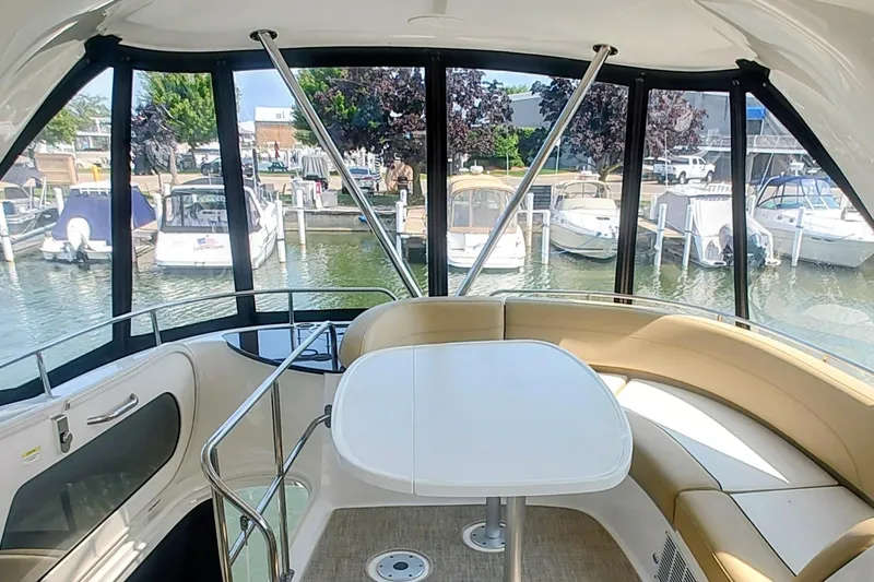 Slide: The Image of Interior of 2015 Meridian 441 Sedan yacht with marina view through windows. - 8
