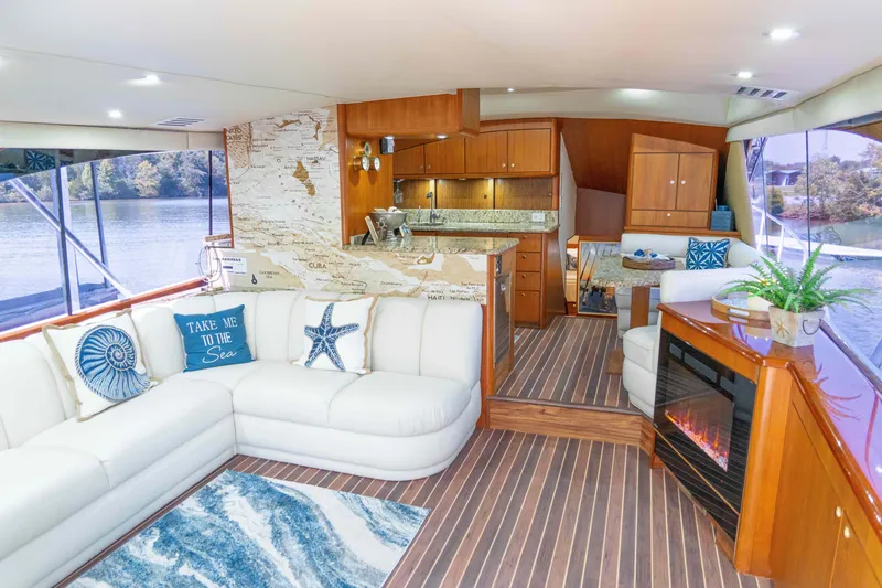 Slide: The Image of Luxurious 1997 Ocean Yachts 60 Sport Fish interior with elegant seating and modern amenities. - 19