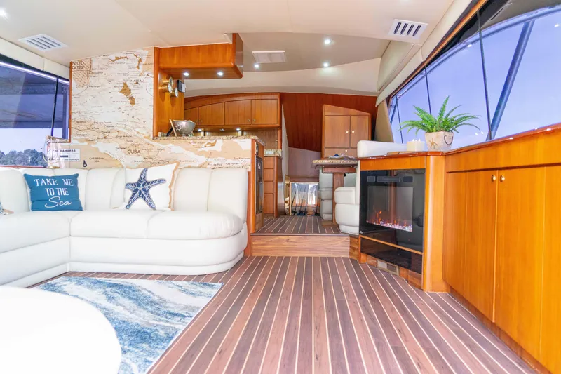 Slide: The Image of Luxurious interior of 1997 Ocean Yachts 60 Sport Fish with elegant wood finishes. - 20