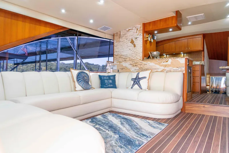 Slide: The Image of Luxurious interior of 1997 Ocean Yachts 60 Sport Fish with elegant seating and nautical decor. - 22
