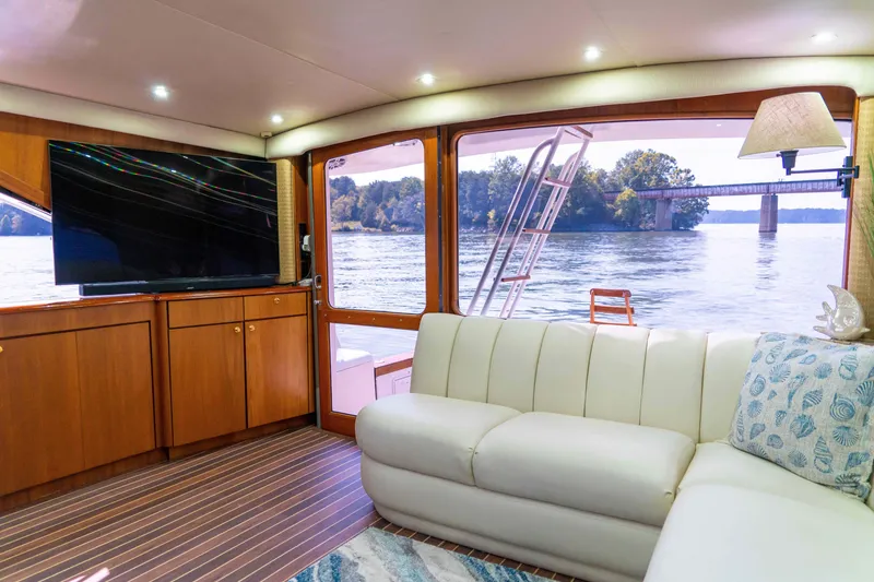 Slide: The Image of Luxurious interior of 1997 Ocean Yachts 60 Sport Fish with scenic water view. - 29