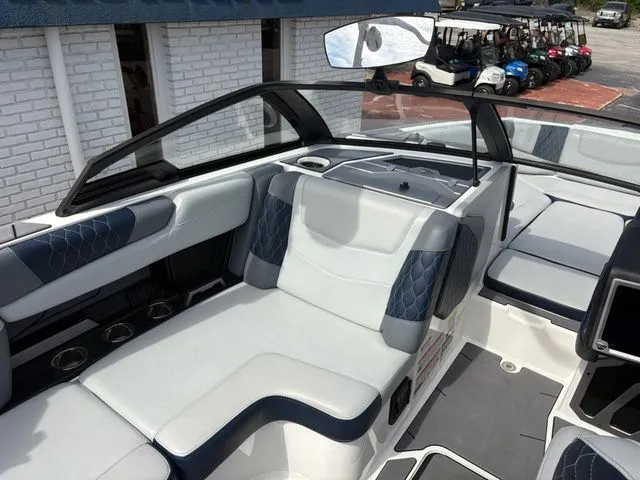 Slide: The Image of Interior of a 2023 Malibu M220 boat with luxurious seating. - 36