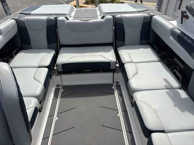 Slide: The Image of Interior of 2023 Malibu M220 boat with gray upholstery. - 37
