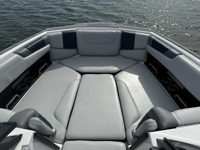 Slide: The Image of Interior of 2023 Malibu M220 boat on the water. - 39