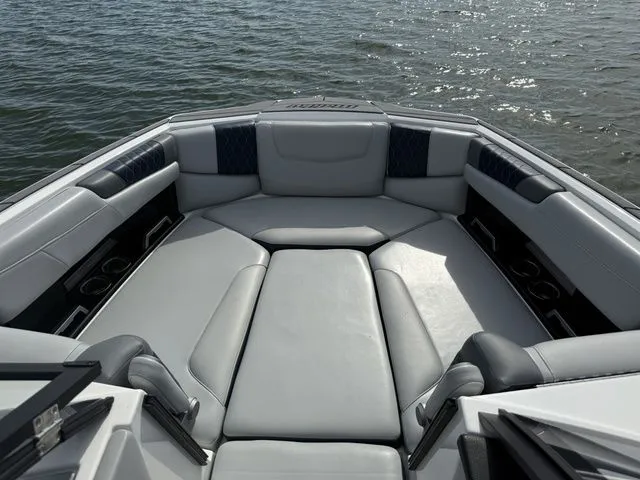 Slide: The Image of Interior of 2023 Malibu M220 boat on the water. - 40