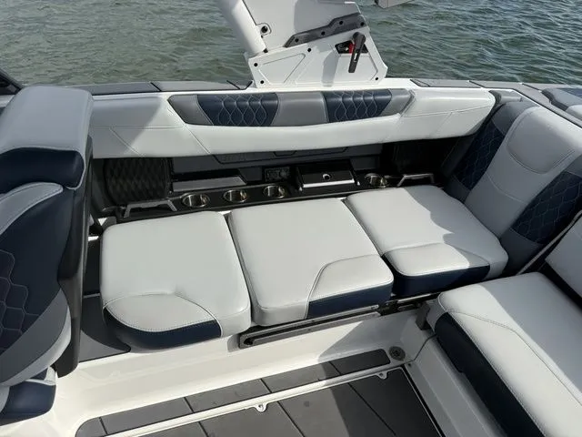 Slide: The Image of Interior of 2023 Malibu M220 with luxurious seating. - 45