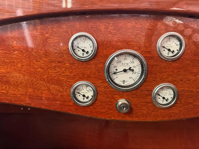 Slide: The Image of Dashboard of 2010 Hacker-Craft Gentleman's Racer Replica with vintage gauges. - 6