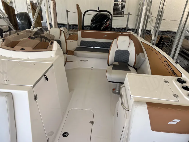 Slide: The Image of 2026 Starcraft SVX 231 OB boat interior with modern seating and sleek design. - 23