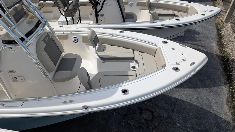 Slide: The Image of 2026 Key West 219 FS boat with spacious seating and sleek design. - 5