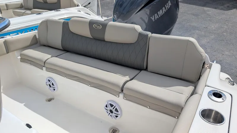 Slide: The Image of 2026 Key West 219 FS boat seating with cup holders and speakers. - 7