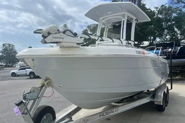 Slide: The Image of 2022 Robalo R222 Center Console boat on trailer, featuring Garmin equipment. - 5