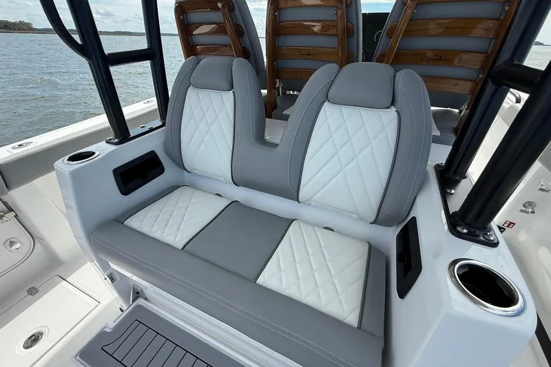 Slide: The Image of Luxury seating on 2026 Everglades 375 Center Console boat, featuring diamond-stitched upholstery. - 16