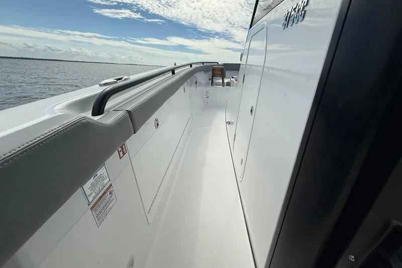 Slide: The Image of 2026 Everglades 375 Center Console boat deck with ocean view. - 23