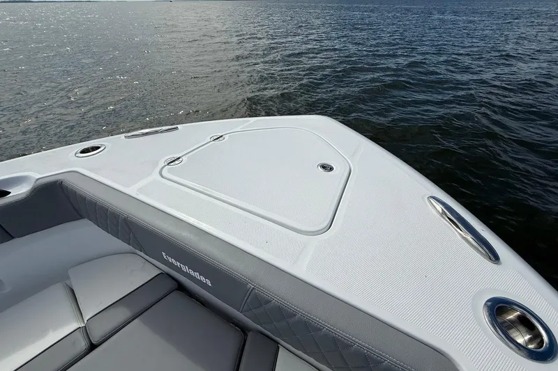 Slide: The Image of 2026 Everglades 375 Center Console boat on water, featuring sleek design and comfortable seating. - 35