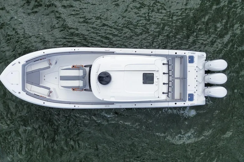 Slide: The Image of 2026 Everglades 375 Center Console boat on water, aerial view. - 6