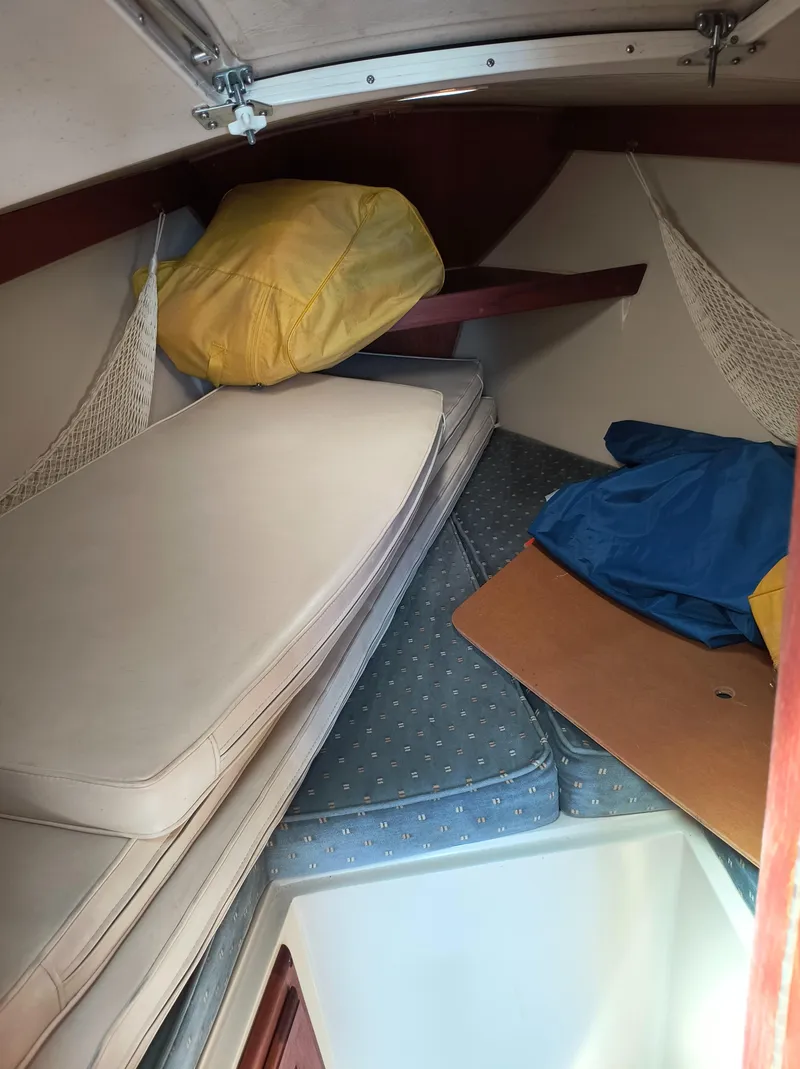 Slide: The Image of Interior cabin of 1985 Catalina 27 sailboat with cushions and storage. - 24