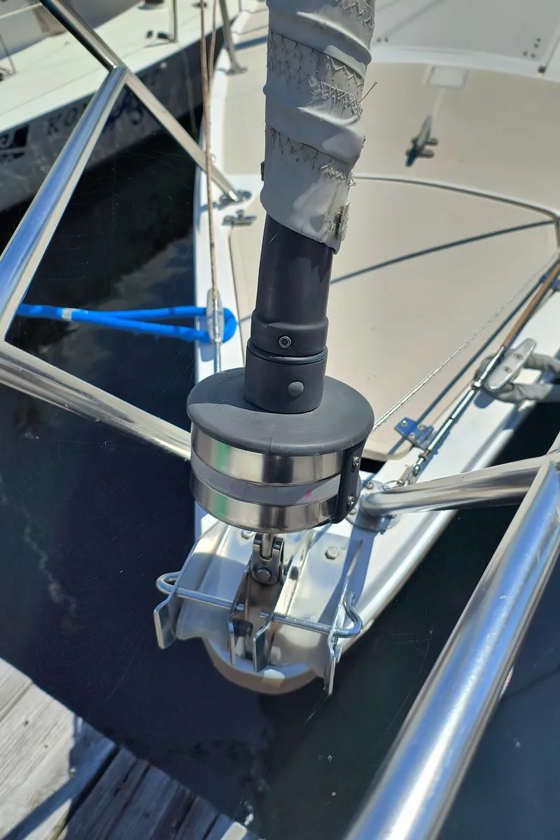 Slide: The Image of Close-up of a 1985 Catalina 27 sailboat's bow with rigging and stainless steel fittings. - 5