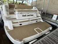 Slide: The Image of 2010 Regal 46 Sport Coupe yacht with open cockpit and sleek design. - 16