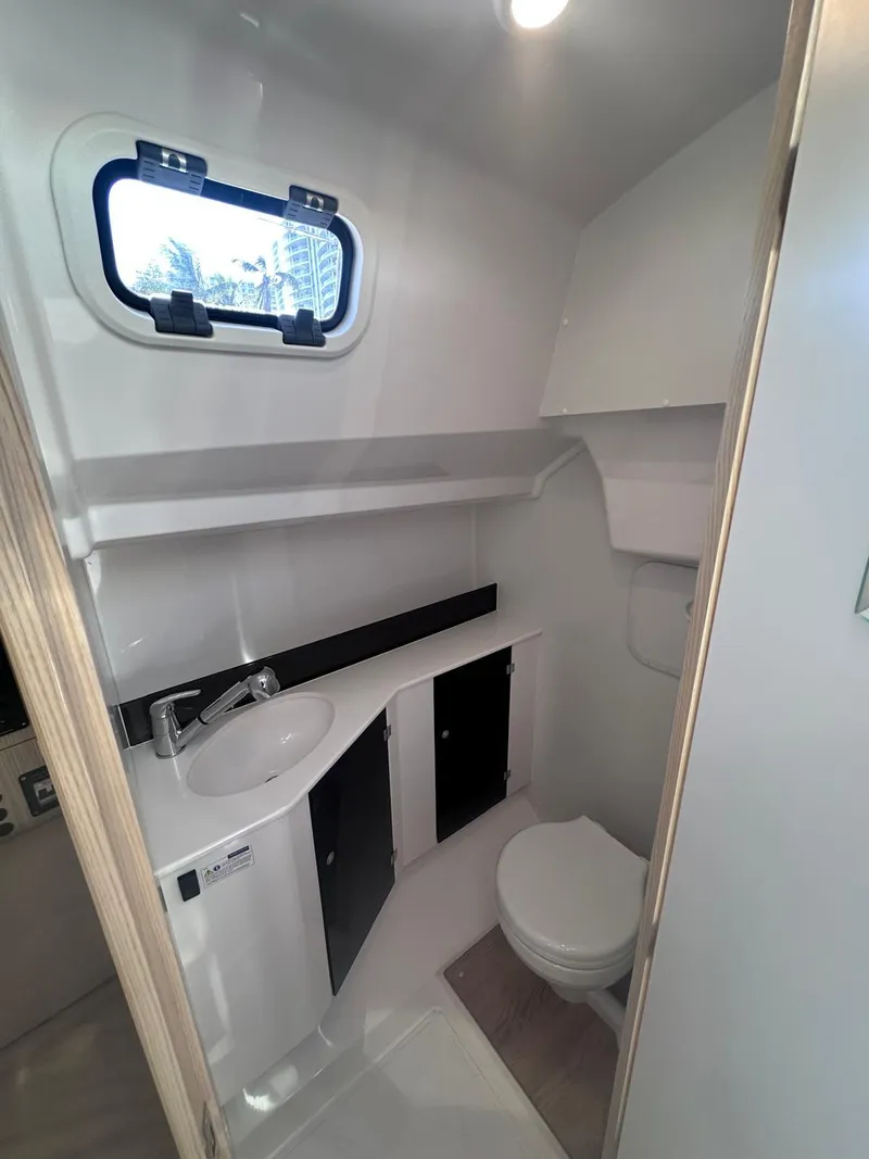 Slide: The Image of Modern bathroom in 2025 Maxus 26 yacht with compact sink and toilet. - 18