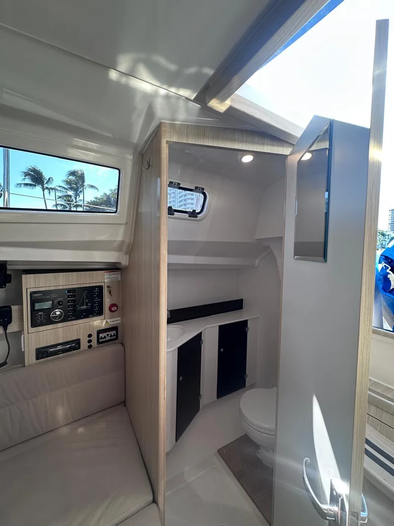 Slide: The Image of Interior of 2025 Maxus 26 yacht, featuring modern cabin and control panel. - 20
