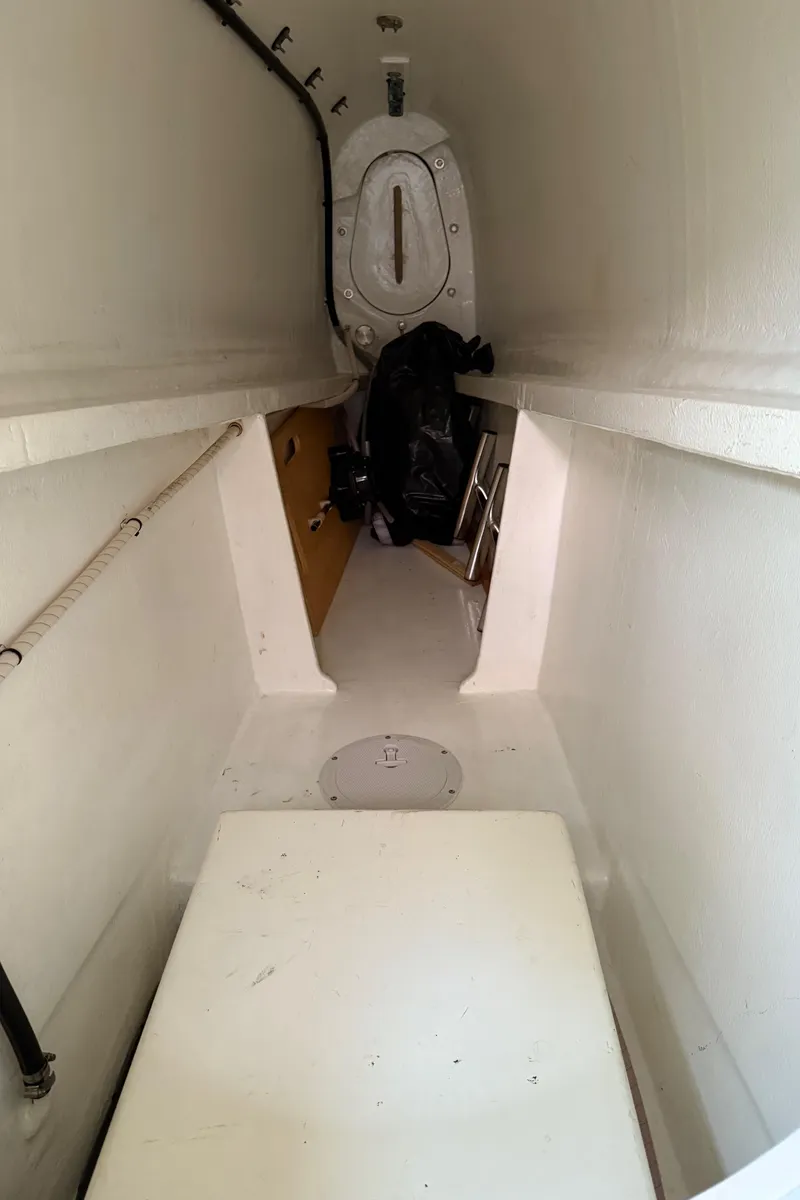 Slide: The Image of Interior view of a 2015 Gunboat 57' yacht, featuring a narrow passageway. - 19