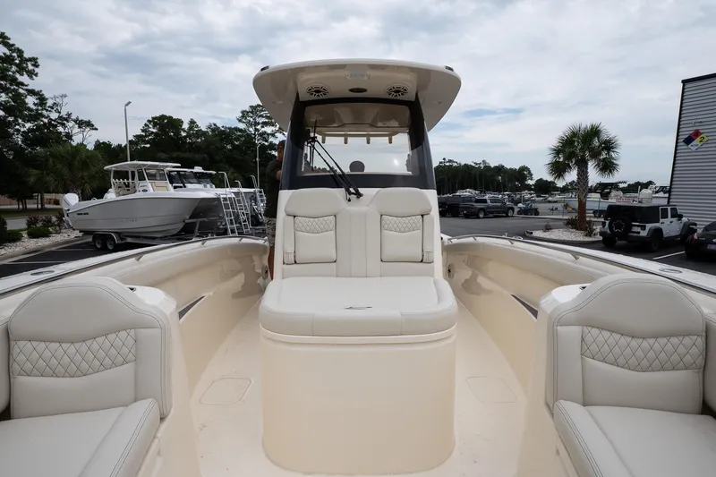 Slide: The Image of 2026 Scout 288 LXF boat interior with luxurious seating and modern design. - 46